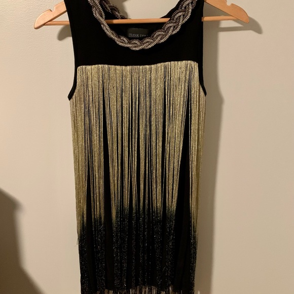 Tank top with gold and shiny black frange. Metal golden collar. - Picture 1 of 4